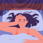 Γυναίκα που έχει ξυπνήσει μέσα στη νύχτα και φαίνεται εξαντλημένη.